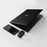 black Macbook near black iPhone 7 Plus and black Apple Watch